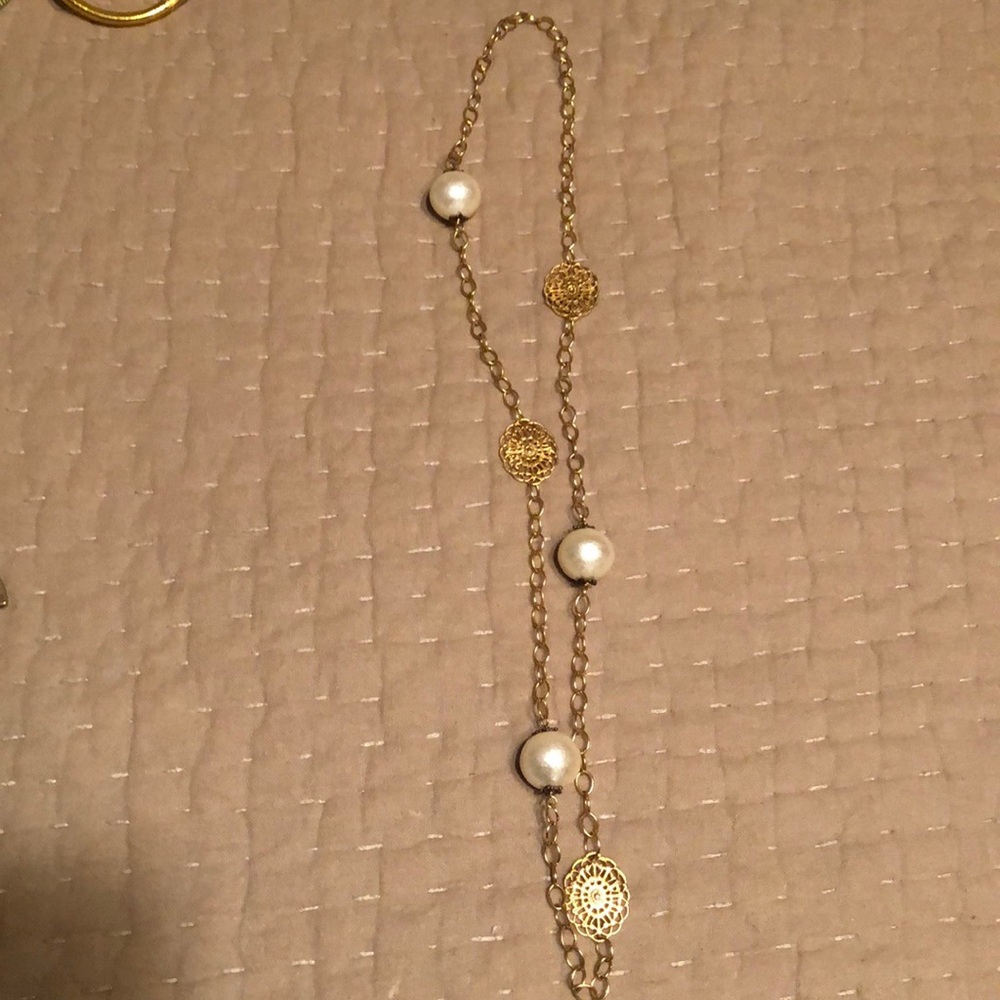 John wind necklace